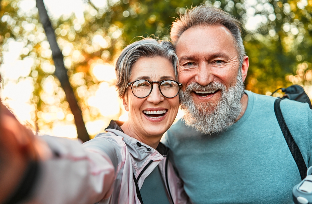 Wonderful,Sincere,Cheerful,Couple,Of,Gray,Haired,Mature,Smiling,People